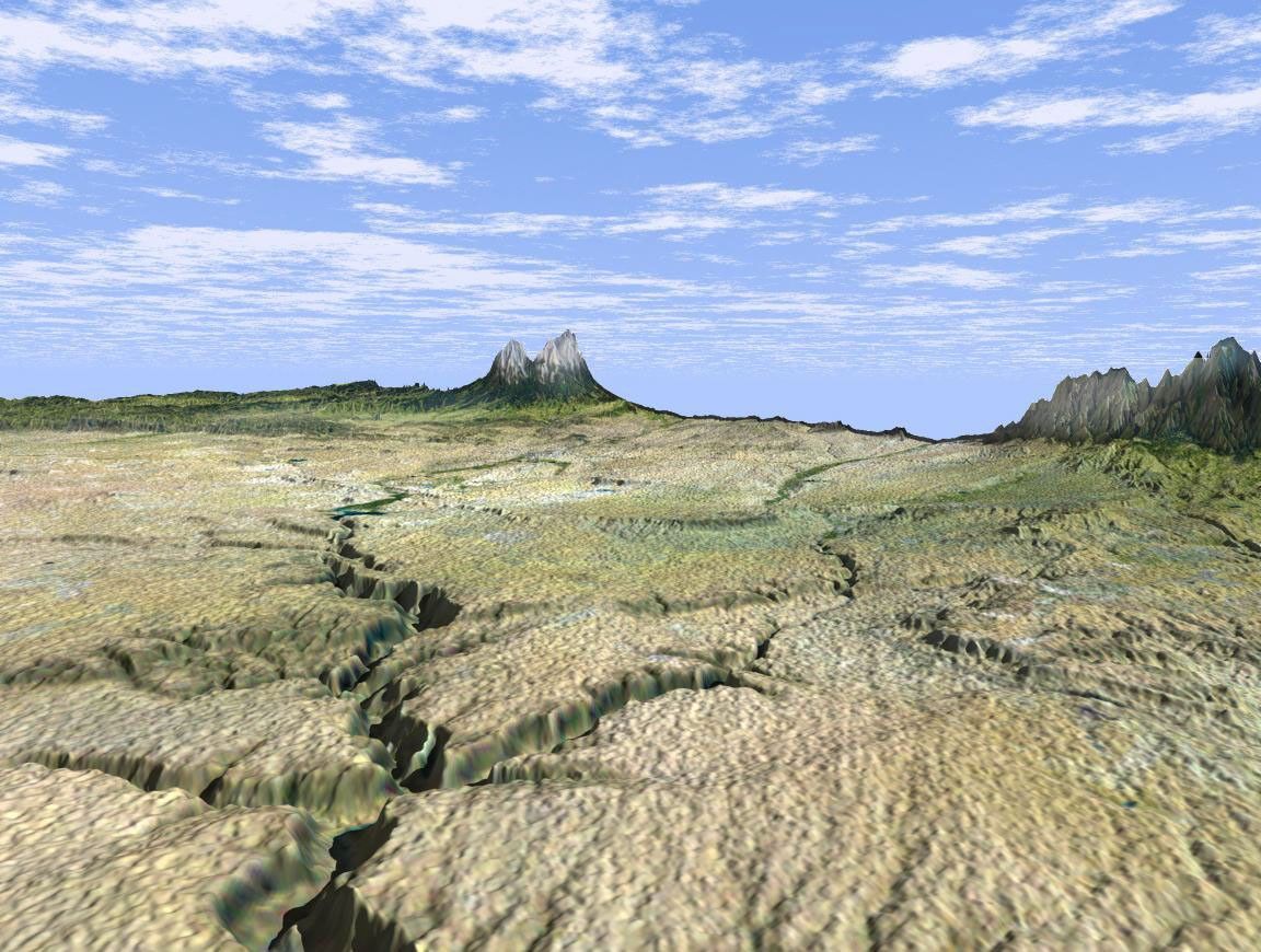 This dramatic view from NASA's Shuttle Radar Topography Mission looks west along the Cucharas River Canyon in Colorado toward the 4,152 meter (13,623 ft) high Spanish Peaks, in the foothills of the Sangre De Cristo Mountains.