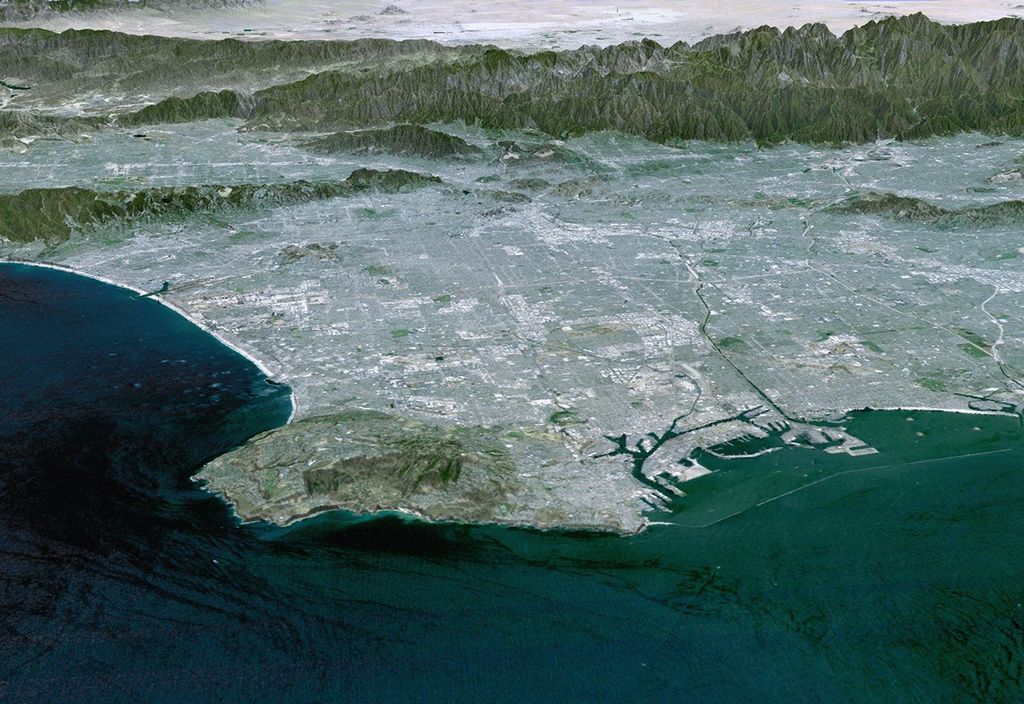 Most of Los Angeles, California is visible in this computer-generated north-northeast perspective viewed by from NASA's Shuttle Radar Topography Mission from above the Pacific Ocean.