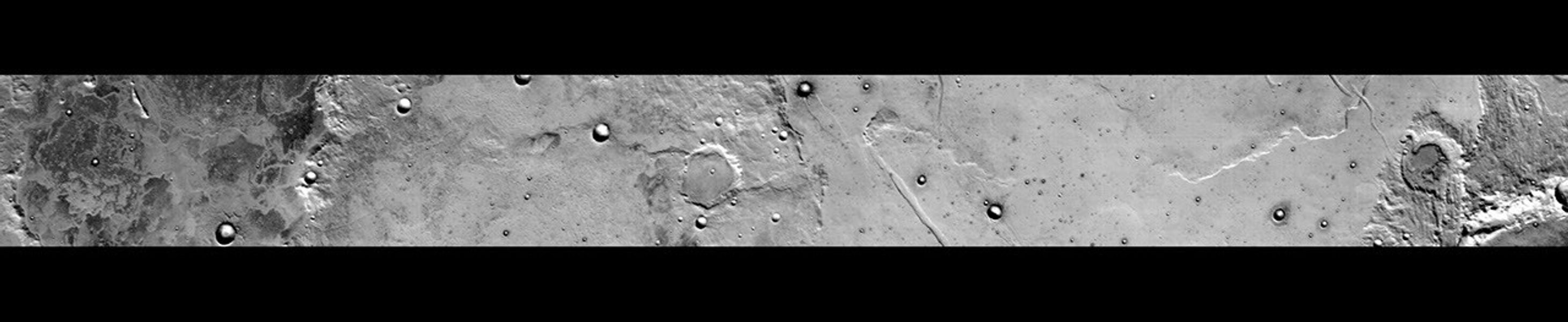 This 300-kilometer (186-mile) long daytime infrared image of Terra Sirenum, taken by NASA's Mars Odyssey spacecraft, displays a wide variety of geologic features. The mottled floor and rim of Koval'skiy Crater is seen at the left (north) of the image.