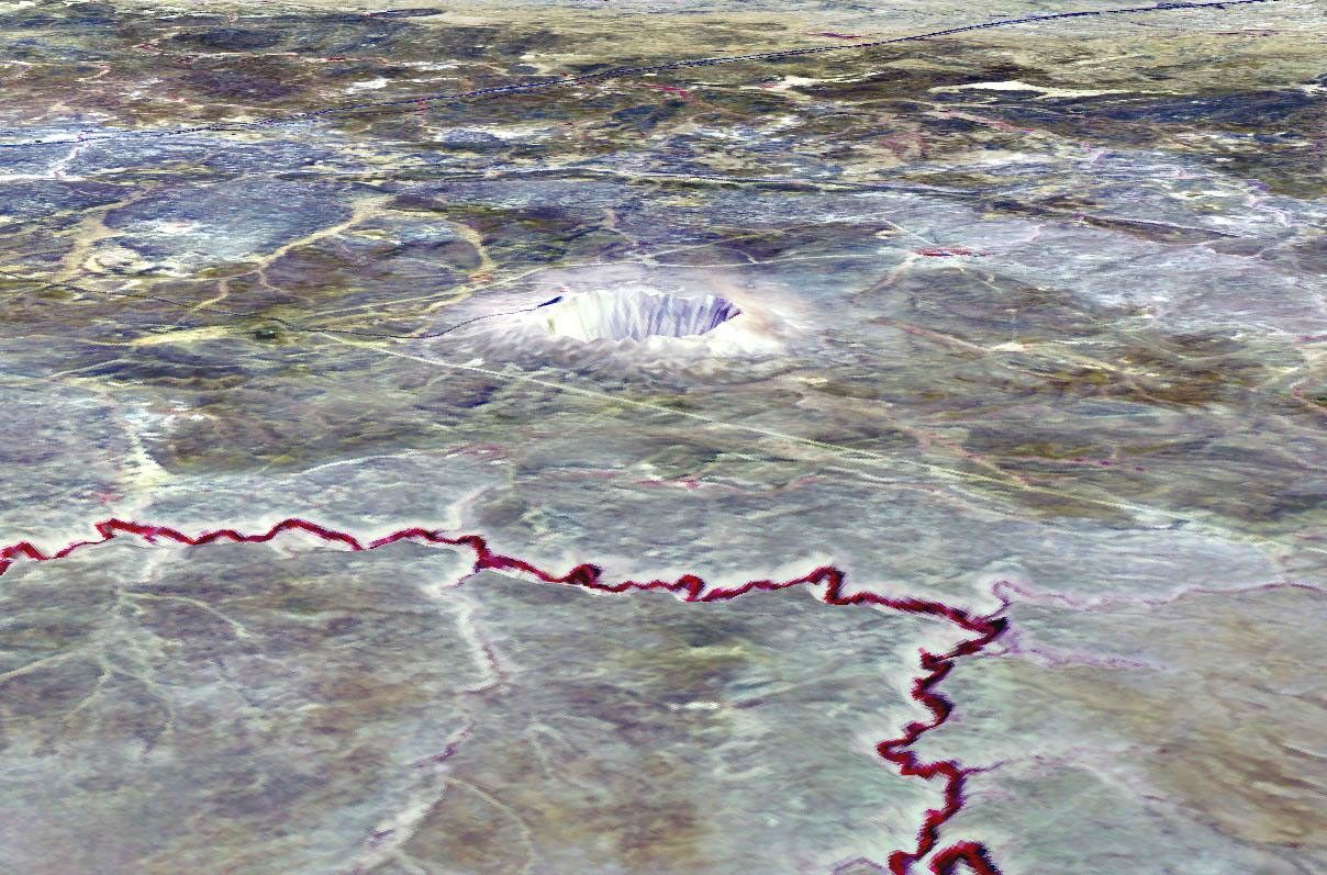 The Barringer Meteorite Crater (also known as 'Meteor Crater') is a gigantic hole in the middle of the arid sandstone of the Arizona desert. This image was acquired by NASA's Terra satellite on May 17, 2001.