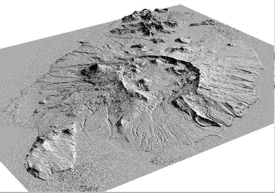 This perspective view shows the caldera of the Okmok volcano in Alaska's Aleutian Islands acquired by NASA's Airborne Synthetic Aperture Radar in 2001.