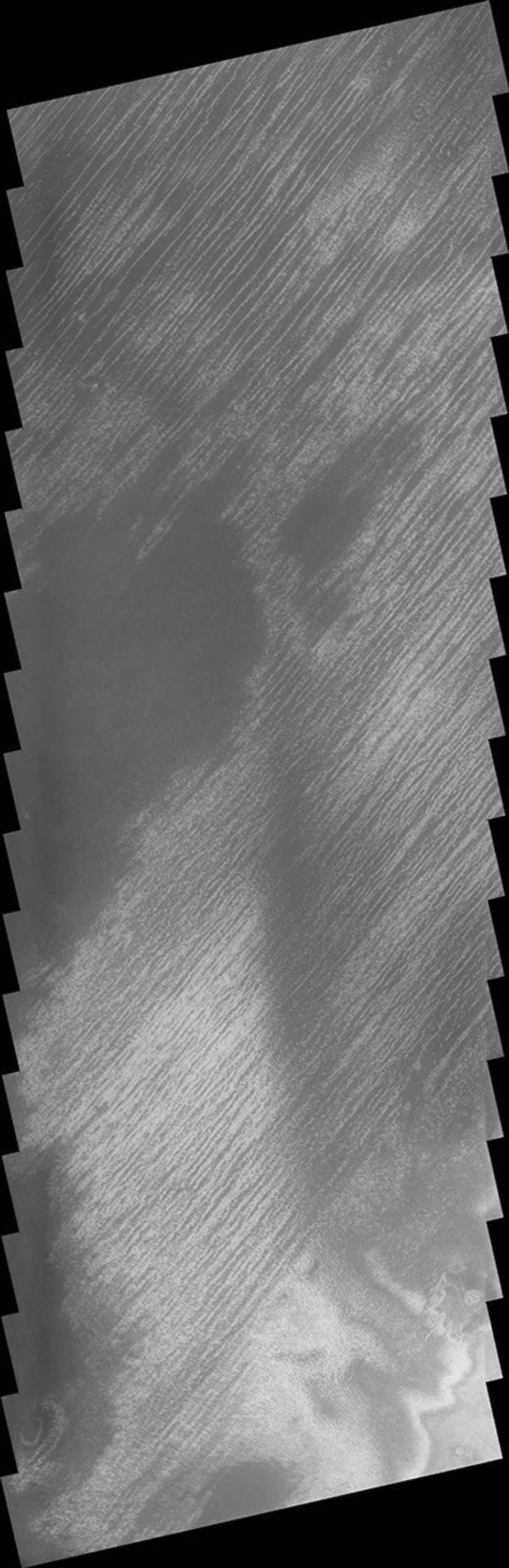 This linear features near the south polar cap on Mars appeared during the height of southern summer as seen by NASA's 2001 Mars Odyssey spacecraft.