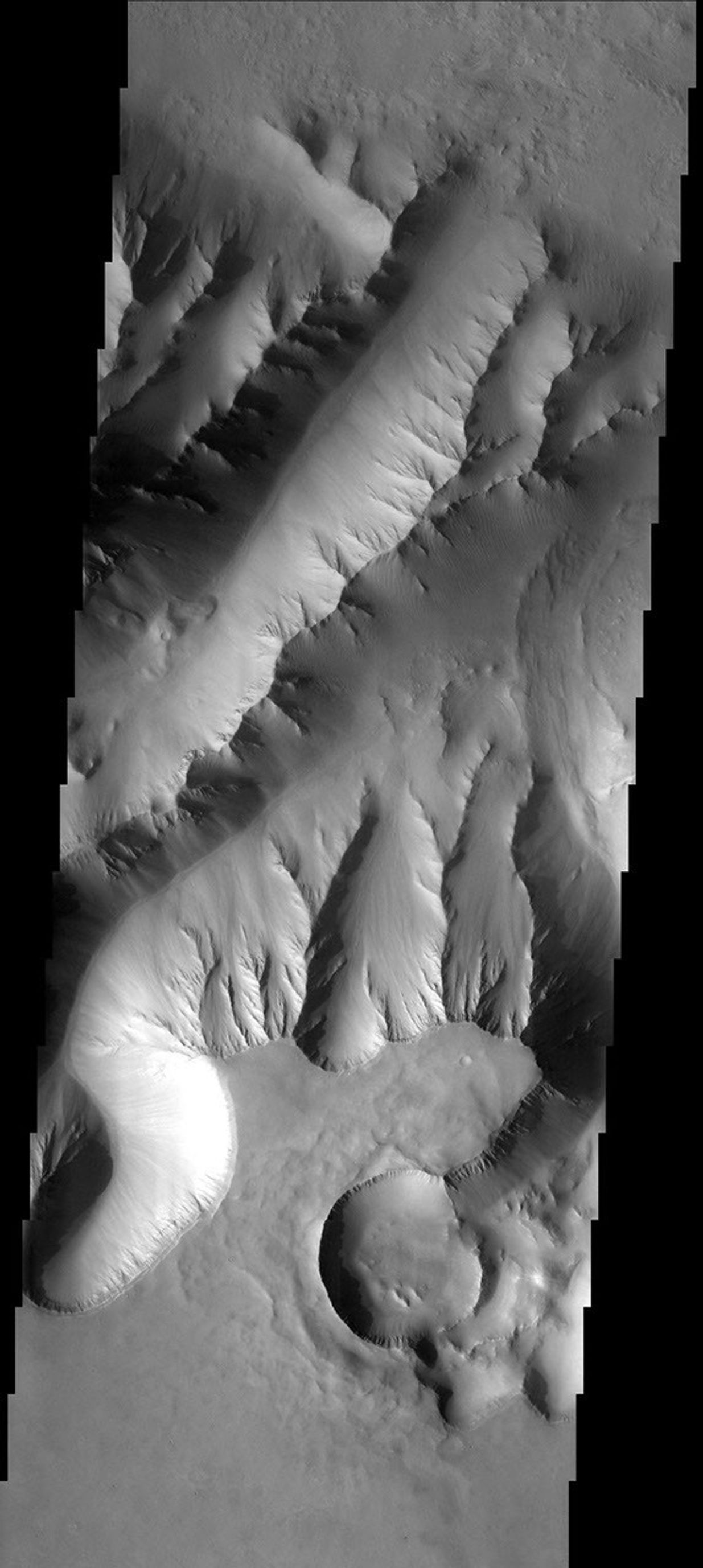 Using the JMars targeting software, eighth grade students from Charleston Middle School in Charleston, IL, selected the location of -8.37N and 276.66E for capture by NASA's 2001 Mars Odyssey spacecraft in its sixth orbit of Mars on Nov. 22, 2005.