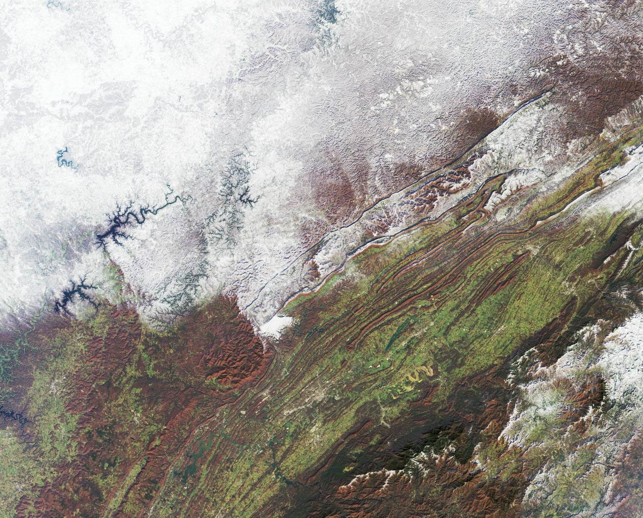 NASA's Terra spacecraft captured the snowstorm which swept across the eastern United States on December 4 and 5, 2002, bringing the season's first snow to parts of the south and southern Appalachia.