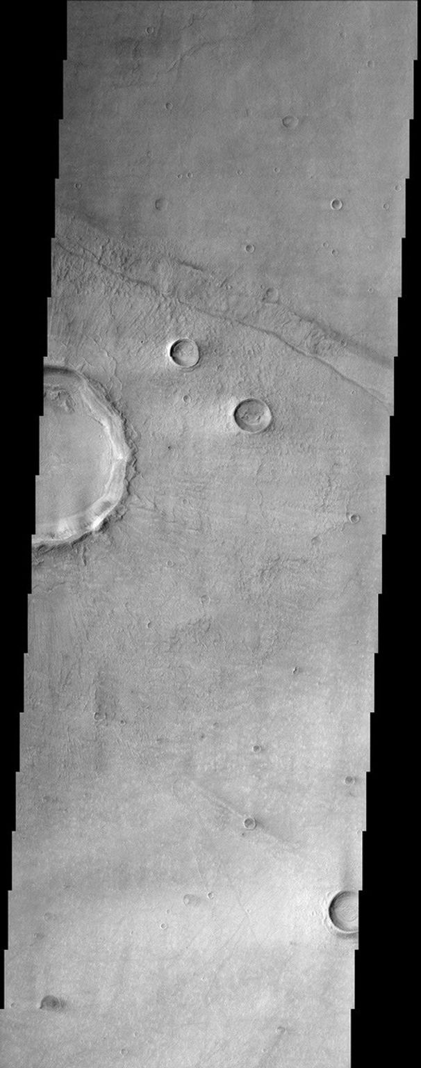 Bosporus Planum, seen in this image from NASA's Mars Odyssey spacecraft, is located in a region of smooth plains that appear to have formed from lava flows.