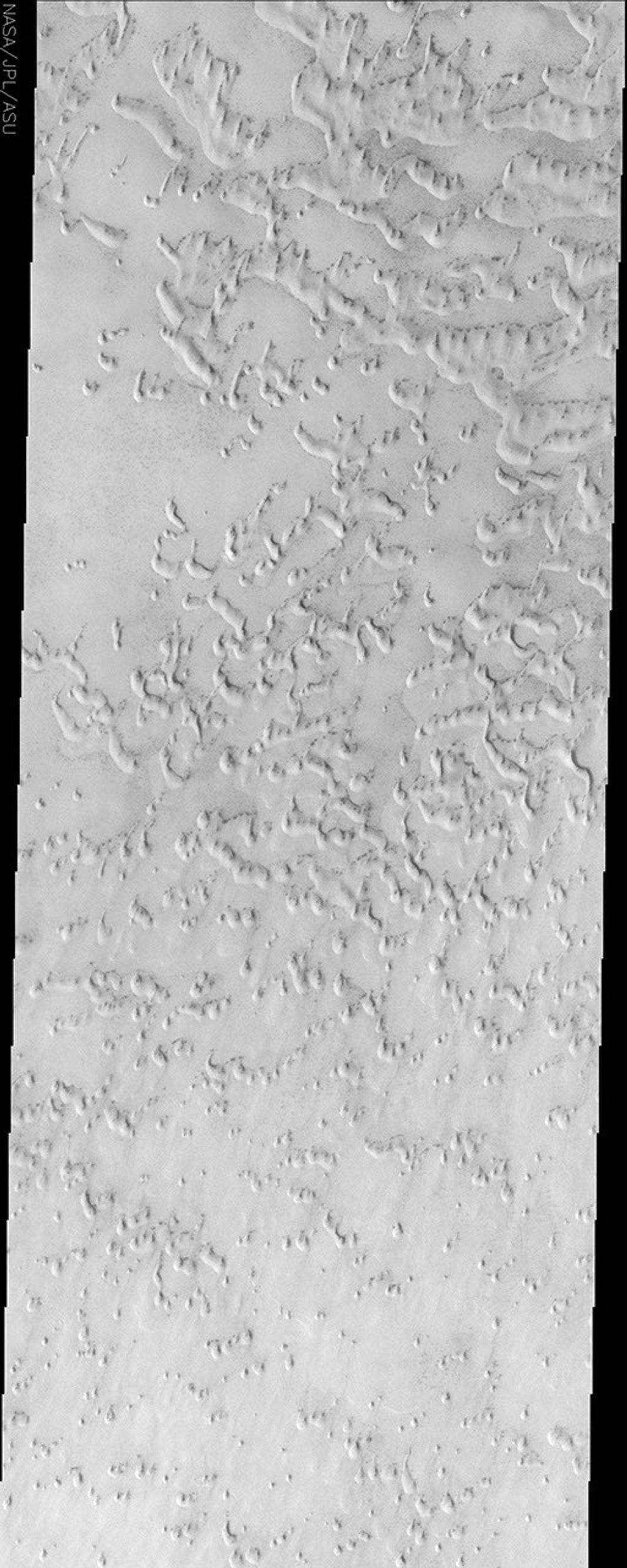 This image from NASA's Mars Odyssey spacecraft displays sand dunes covered in CO2 frost. This is a region of Mars that contains circumpolar sand seas.