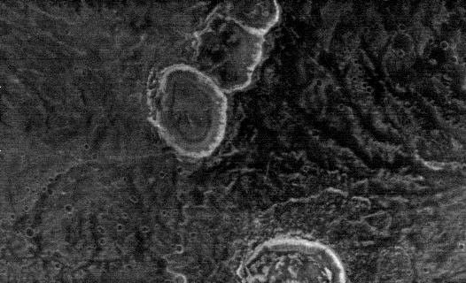 NASA's Mars Odyssey spacecraft takes a look at THEMIS image as art. Many science-fiction writers have postulated many life forms on Mars. It's cold on Mars, perhaps a snowman?