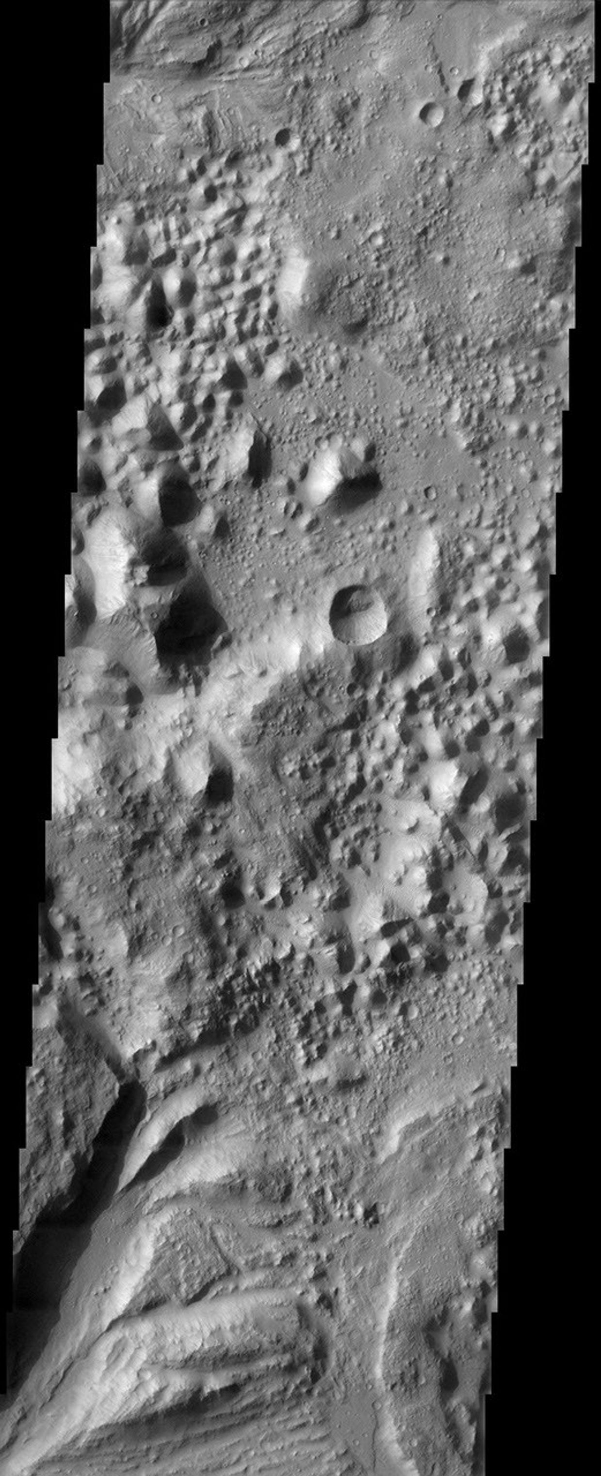 This image of Hydaspis Chaos from NASA's Mars Odyssey spacecraft shows the source terrain for several outflow channels on Mars.