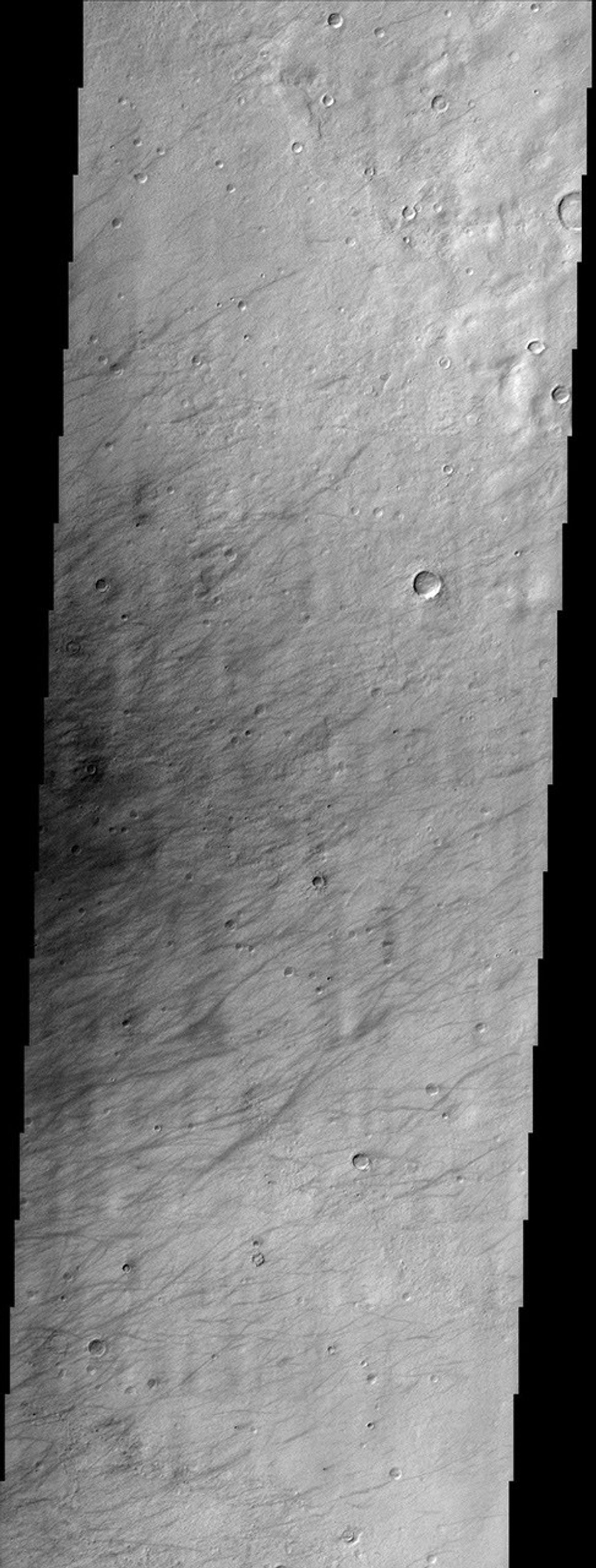 This image from NASA's Mars Odyssey shows a region called Terra Sirenum in Mars' southern hemisphere named for the Sea of the Sirens from Greek Mythology. This is not a sea, however, but a relatively dusty, high albedo region of Mars.