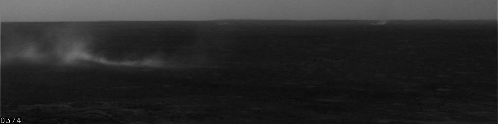 This image shows some distant dust devils and one closer one blowing across the floor of Mars' Gusev Crater. It consists of frames taken by the navigation camera on NASA's Mars Exploration Rover Spirit on July 7, 2005.
