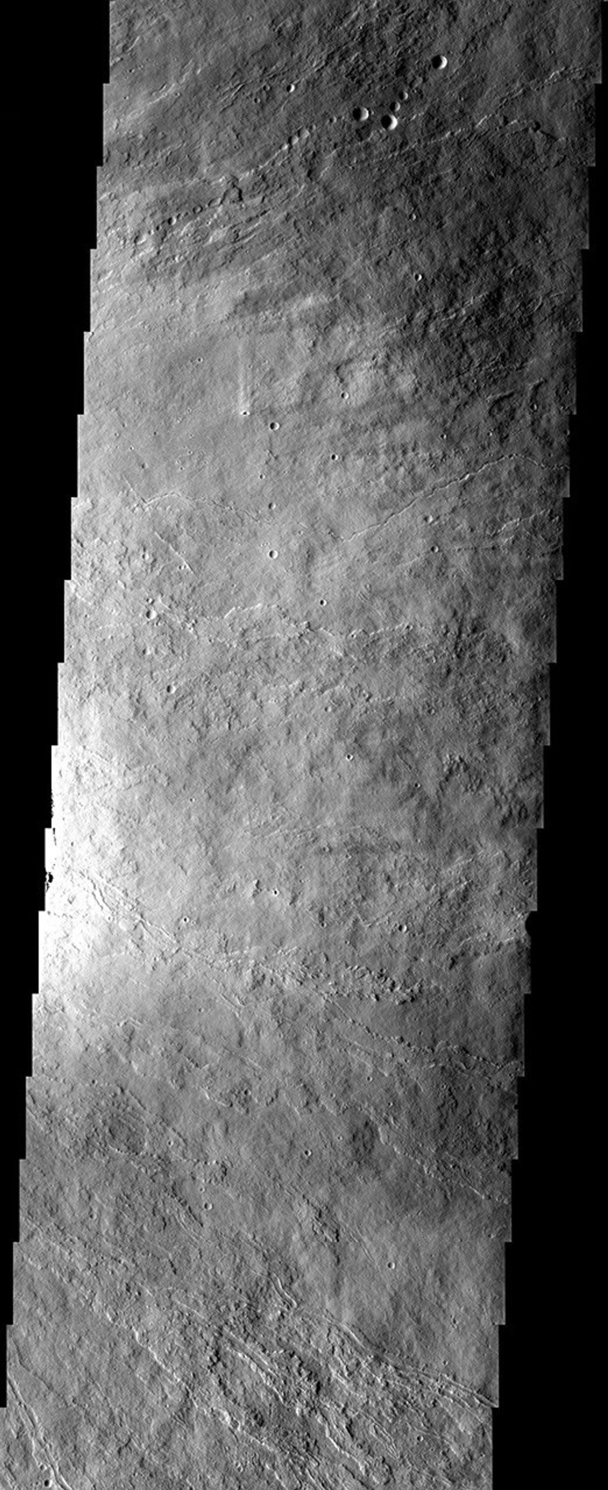 The surface textures observed in this NASA Mars Odyssey image of Ascraeus Mons are due to different volcanic flow types. Textural variations can be produced under a variety of different conditions such as varying cooling and flow rates.