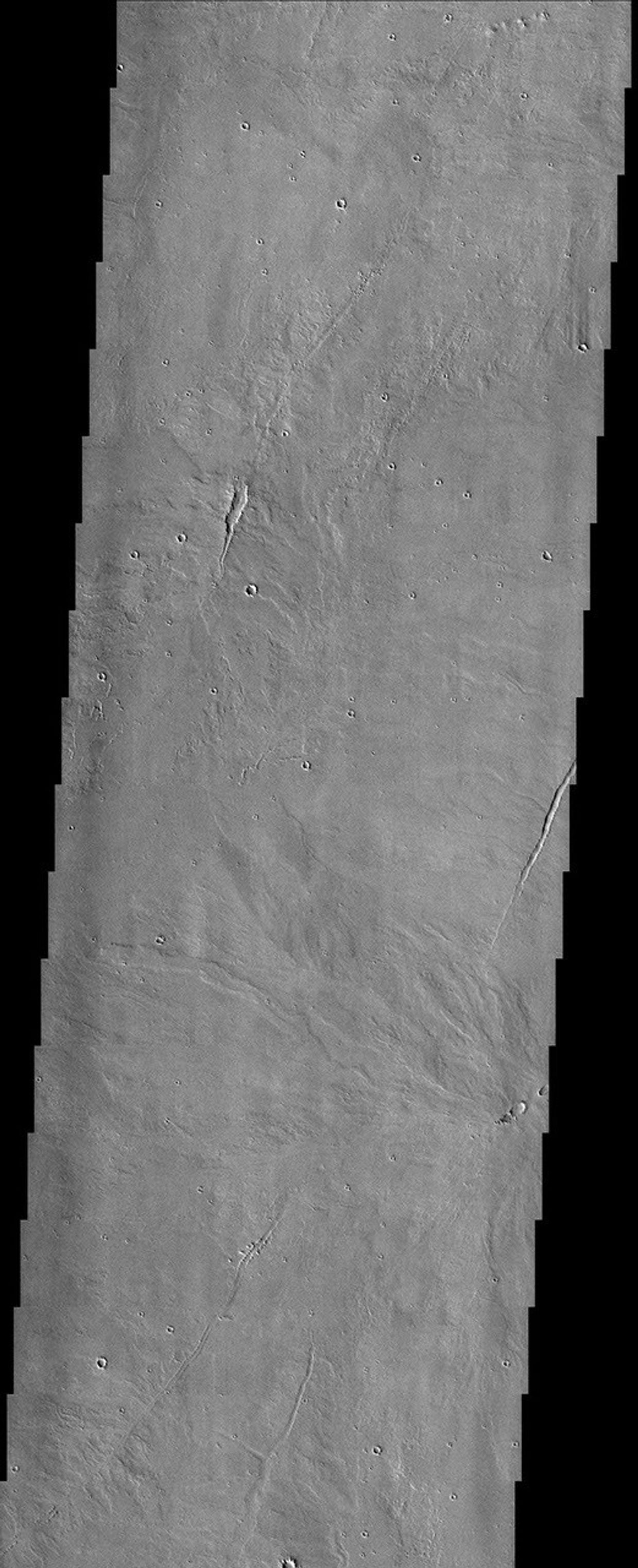 The Tharsis province of Mars was the main center of volcanism on the planet. This image was captured by NASA's Mars Odyssey spacecraft in September 2003.