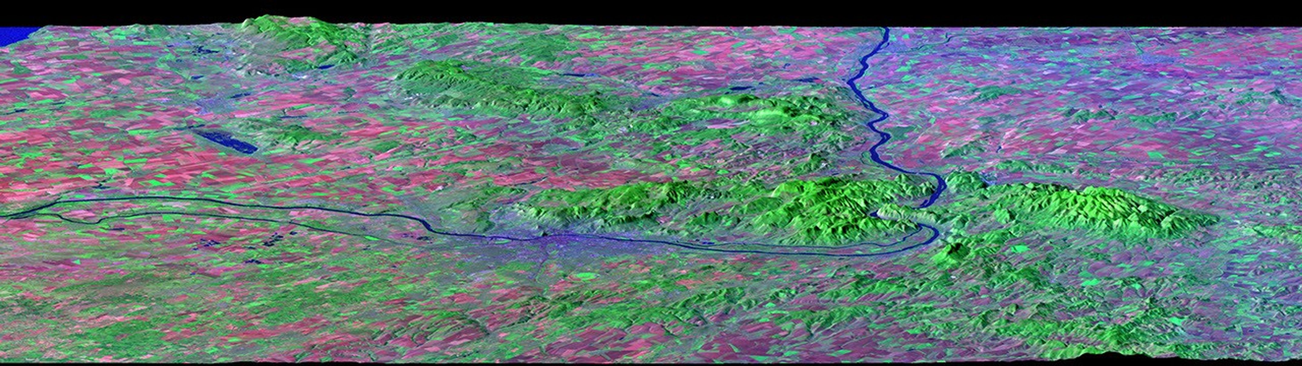 This image from NASA's Landsat shows the Danube River flows east as it enters this west-looking scene (upper right) and forms the border between Slovakia and Hungary.