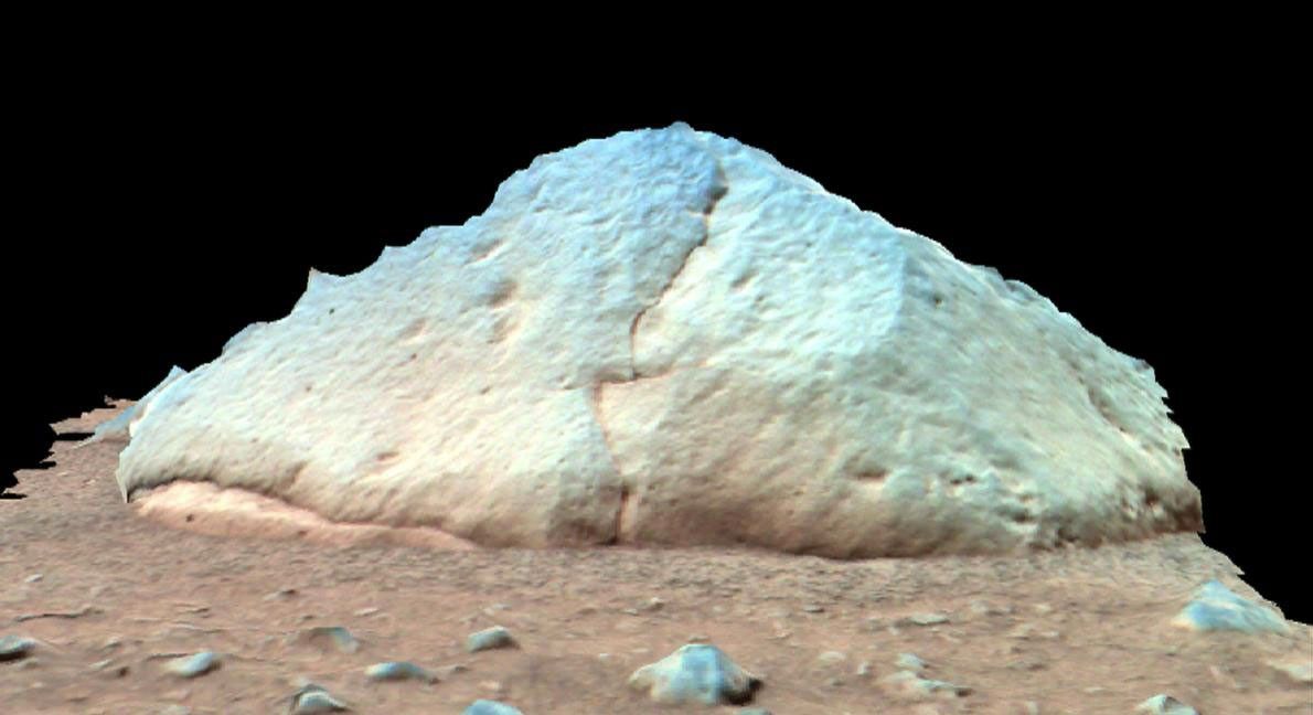 NASA's Mars Exploration Rover Spirit shows 'Adirondack,' the rover's first target rock. Spirit traversed the sandy martian terrain at Gusev Crater to arrive in front of the football-sized rock on Sunday, Jan. 18, 2004.