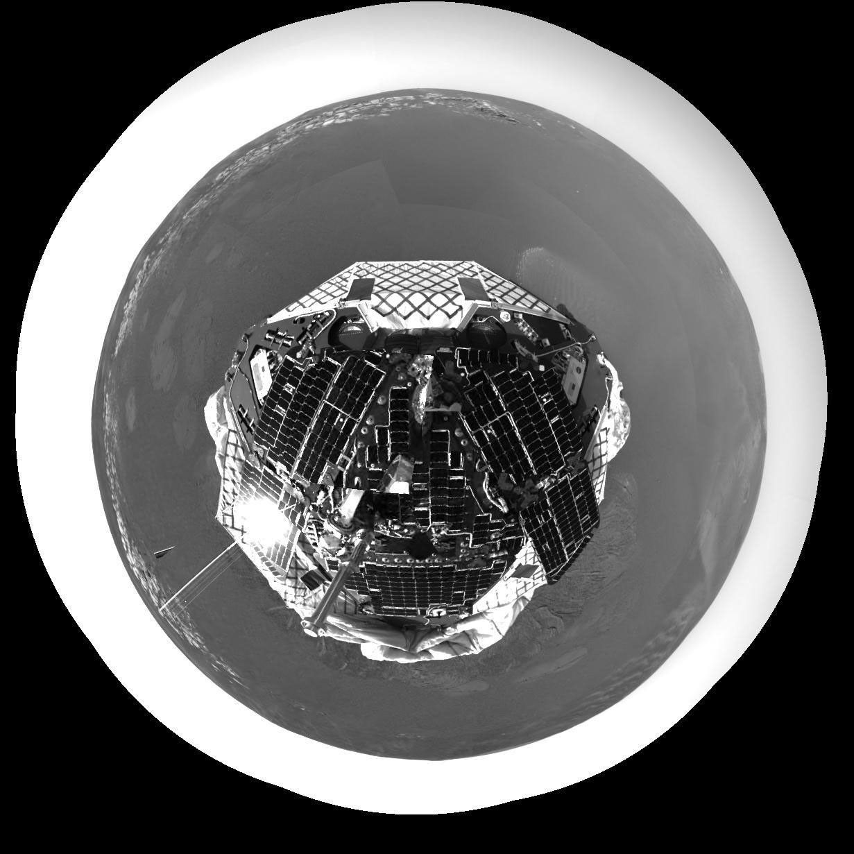 NASA's Mars Exploration Rover Opportunity shows an overhead perspective of the rover. Opportunity's view of the martian horizon can also be seen in this overhead perspective of the rover at Meridiani Planum.