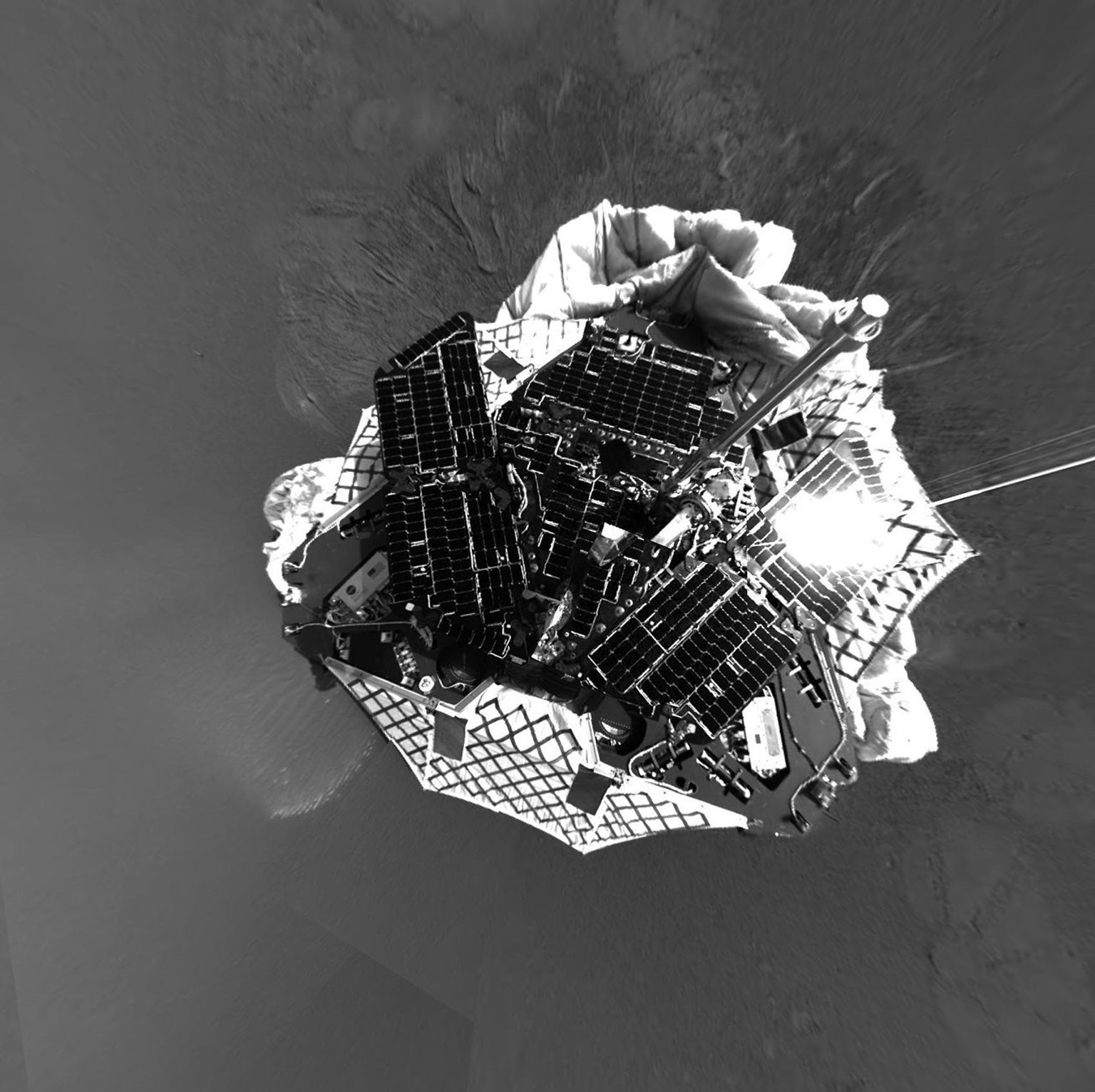 NASA's Mars Exploration Rover Opportunity shows an overhead perspective of the rover. Opportunity's view of the martian horizon can also be seen in this overhead perspective of the rover at Meridiani Planum.