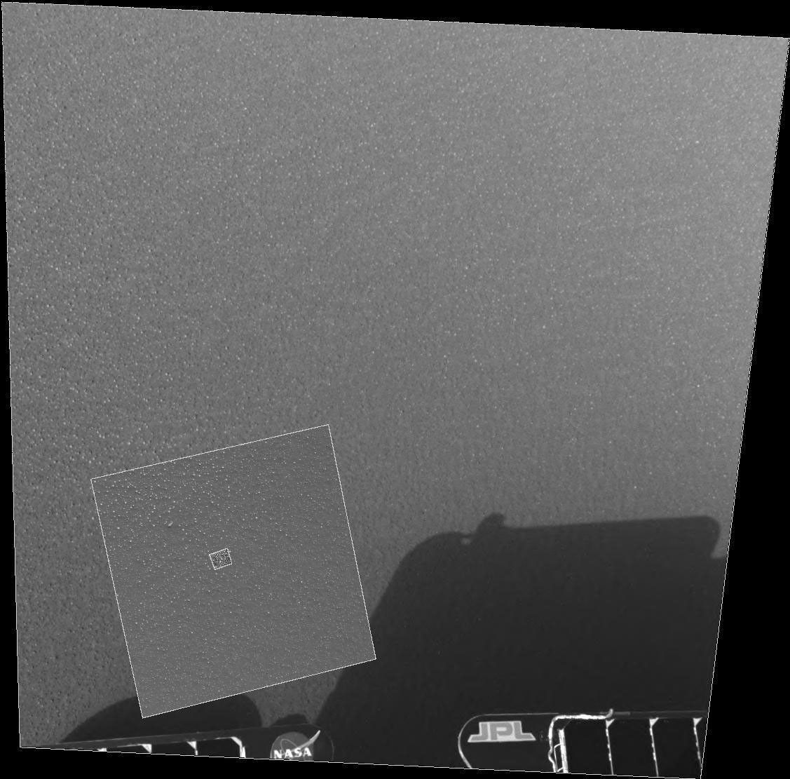 NASA's Mars Exploration Rover Opportunity highlights the patch of soil in a shallow crater at Meridiani Planum, Mars.