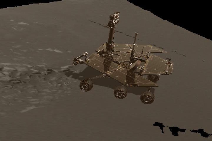 This image is a still from a computer-generated animation showing NASA's Mars Exploration Rover inspecting the rock dubbed Stone Mountain with its instrument deployment device, or arm.