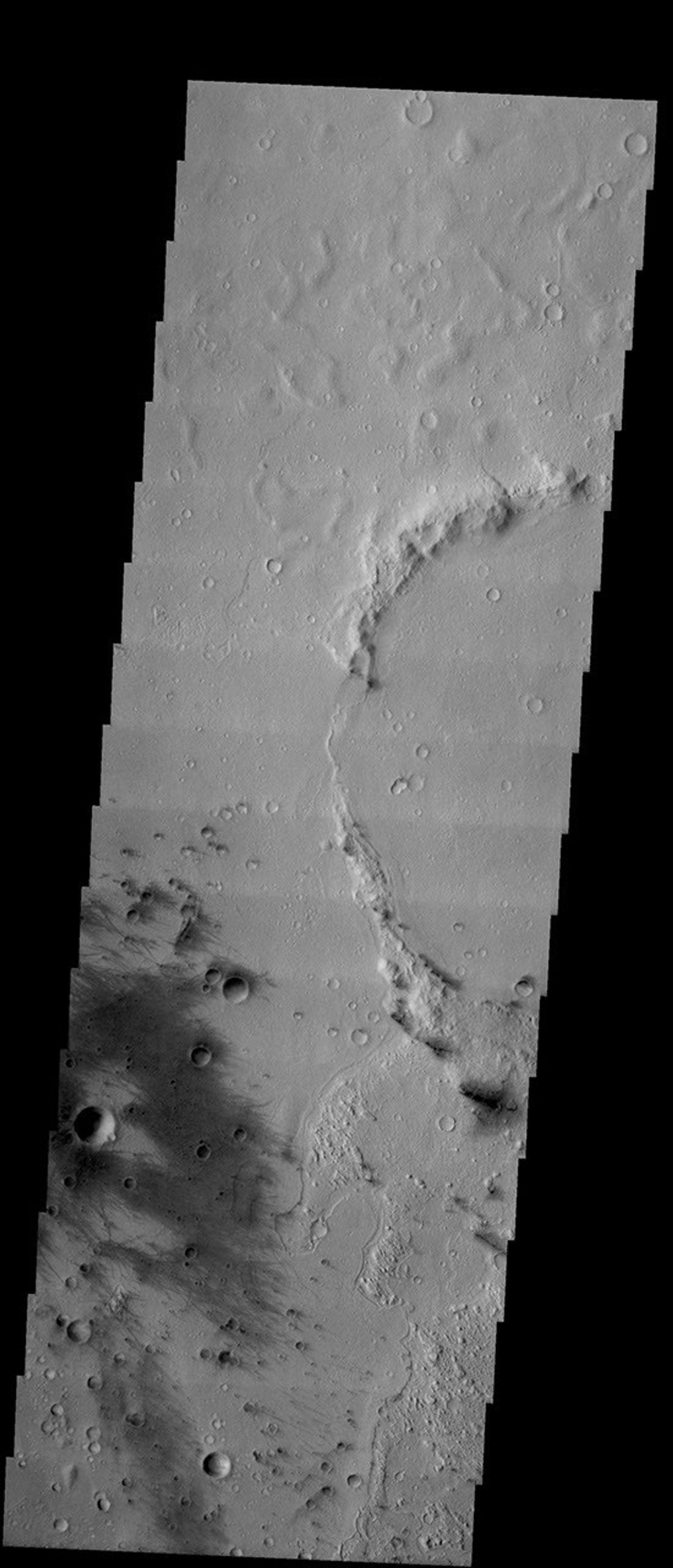 This image from NASA's 2001 Mars Odyssey released on Jan 6, 2004 shows Gusev Crater, the site of Mars Exploration Rover Spirit's landing on Mars.