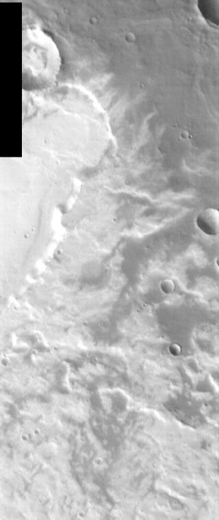 This image, part of an images as art series from NASA's 2001 Mars Odyssey released on Feb 16, 2004 shows the martian suface looking like a roaring fire.