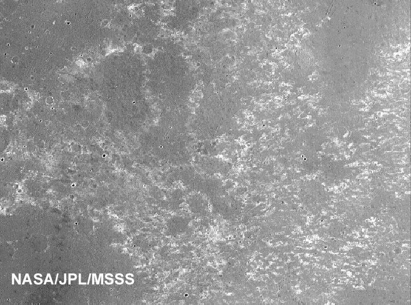 NASA's Mars Global Surveyor shows dark, relatively smooth plains of Meridiani Planum, where the Mars Exploration Rover Opportunity landed.