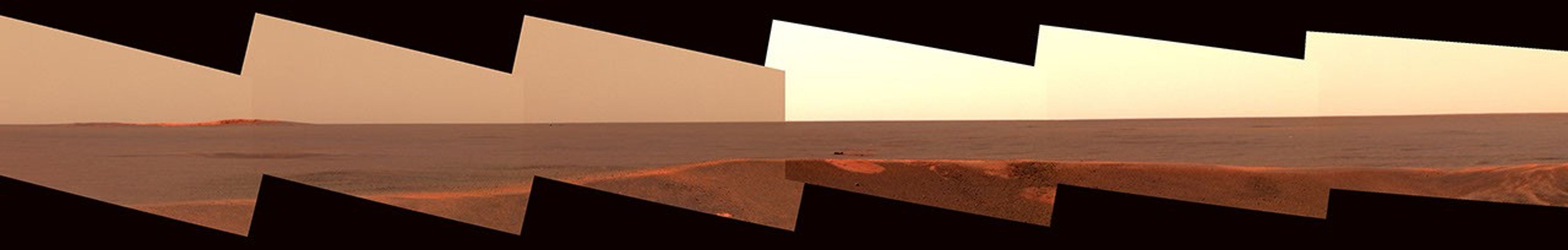 This image mosaic from the panoramic camera on NASA's Mars Exploration Rover Opportunity shows the distant horizon from Opportunity's position inside a small crater at Meridiani Planum, Mars.