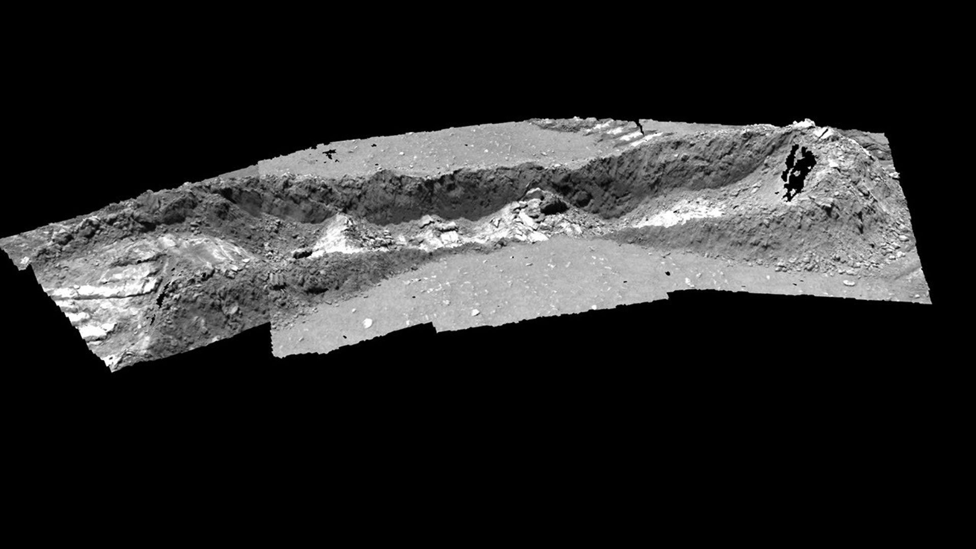 This image shows a 3-dimensional model of the trench dug by NASA's Mars Exploration Rover Spirit at a shallow depression dubbed 'Laguna Hollow.' The rover dragged one of its wheels back and forth across the surface to create this 3-inch deep hole.