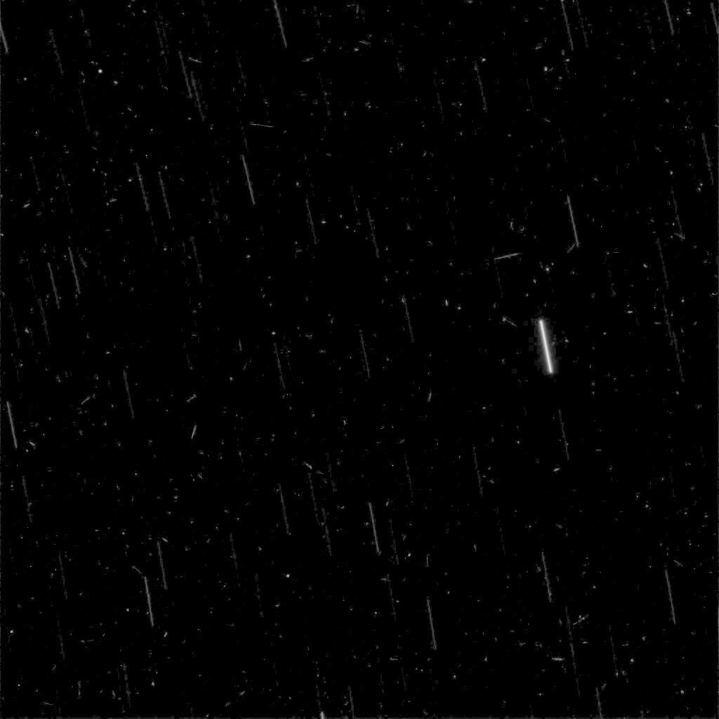 In this five-minute exposure taken from the surface of Mars by NASA's Spirit rover, stars appear as streaks due to the rotation of the planet, and instantaneous cosmic-ray hits appear as points of light.