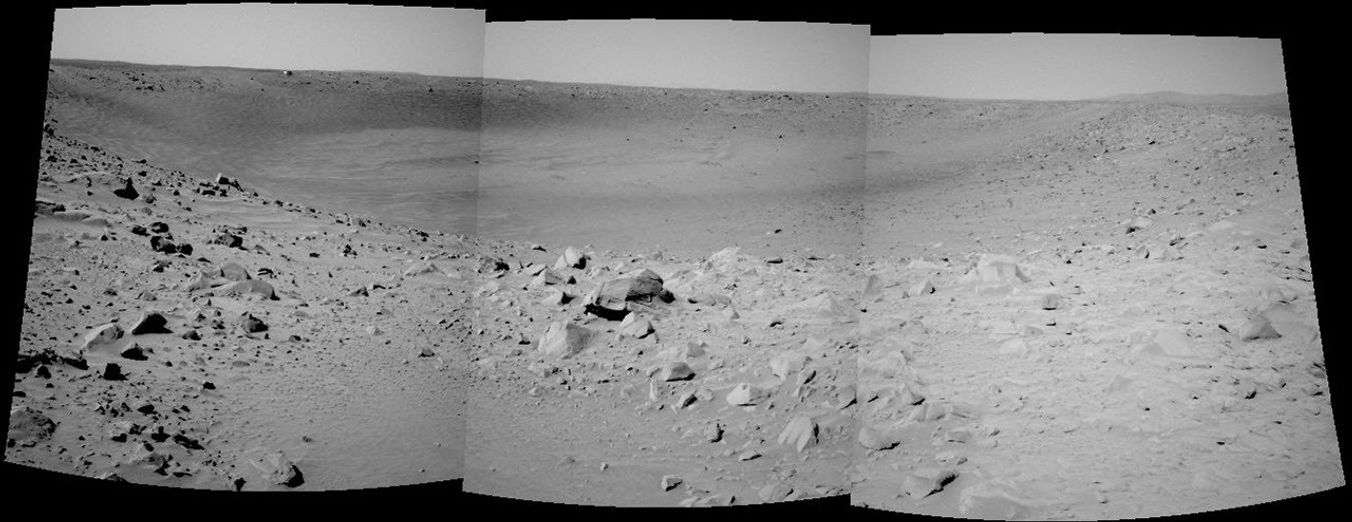 NASA's Mars Exploration Rover Spirit took this mosaic of the crater called 'Bonneville' to get a better vantage point. The rover is close enough to the edge to see the crater's interior, but high and far enough back to get a view of all of the walls.