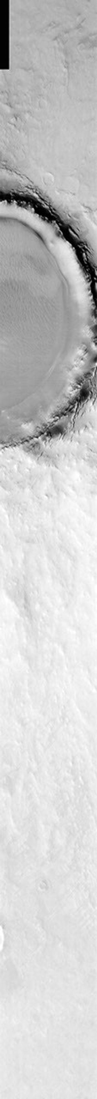 This image from NASA's 2001 Mars Odyssey was collected October 19, 2002 during the northern spring season on Mars. In this image Korolev Crater and its surroundings are still frost covered.