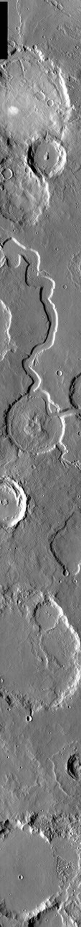 This image from NASA's 2001 Mars Odyssey released on March 18, 2004 shows a younger channel cutting through an older crater on Mars.