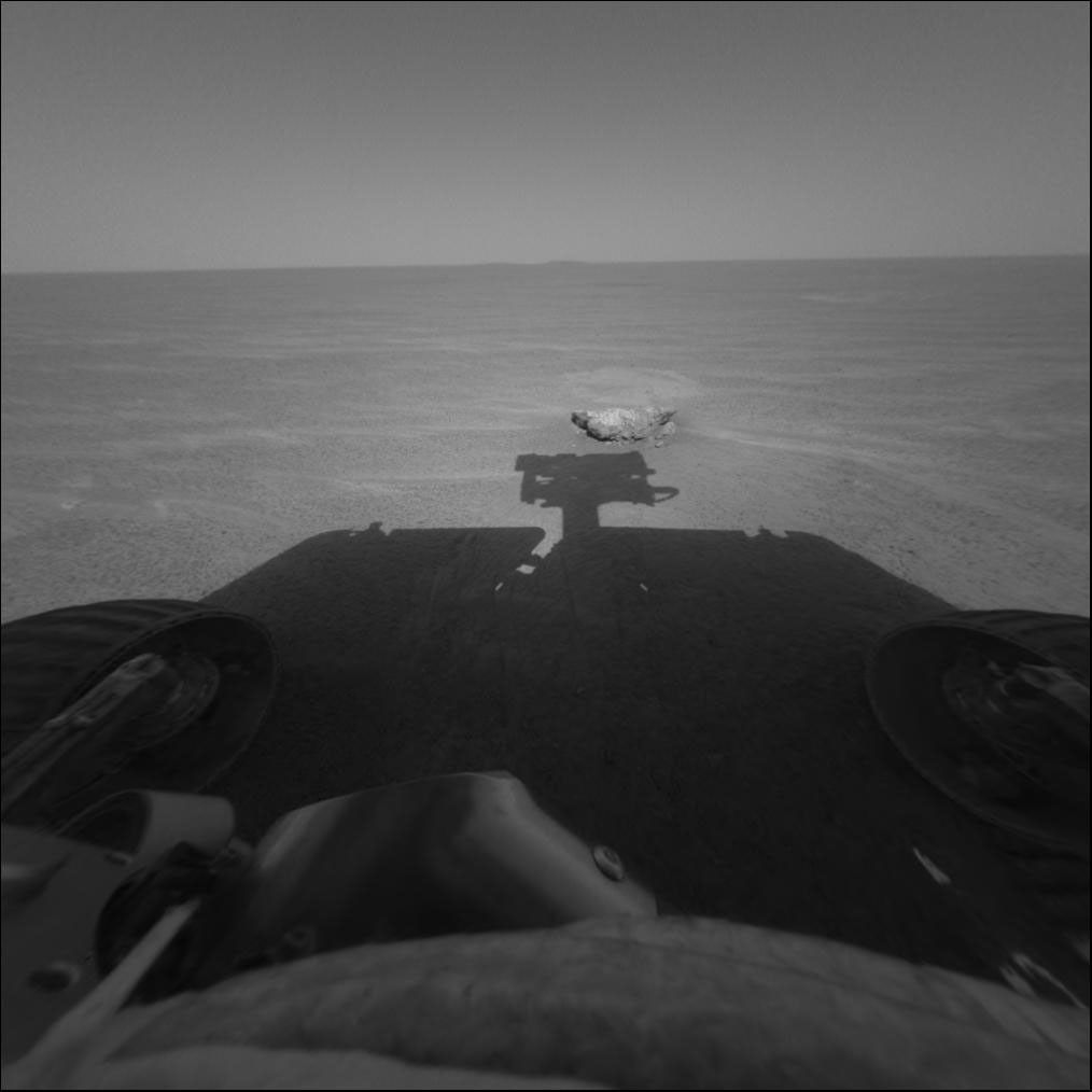 NASA's Mars Exploration Rover Opportunity focuses on the rock dubbed 'Bounce,' which the rover's airbag-wrapped lander hit upon landing in Meridiani Planum, Mars in 2004.