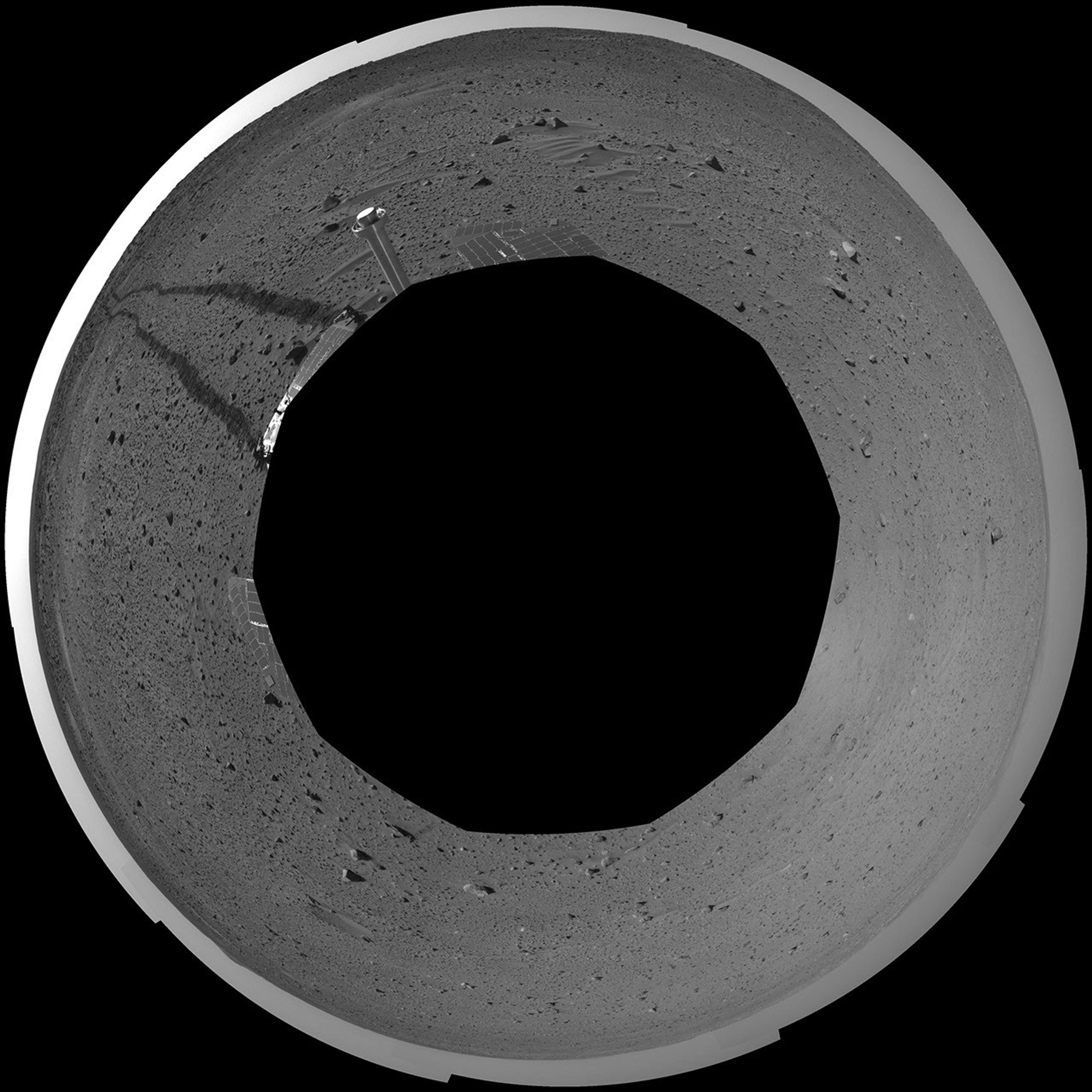 This polar-projection mosaic was created from navigation camera images that NASA's Mars Exploration Rover Spirit acquired on sol 100 (April 14, 2004). It reveals Spirit's view after a century of sols on the martian surface.