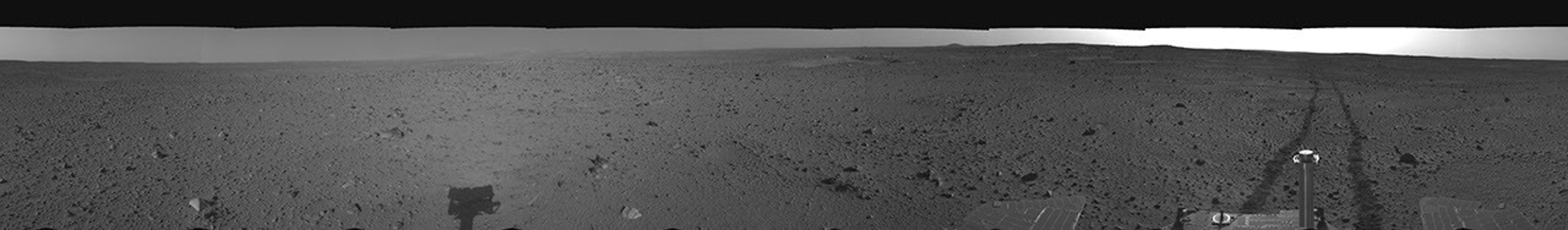 This cylindrical-projection mosaic was assembled from images taken by the navigation camera on the Mars Exploration Rover Spirit on April 24, 2004 at a region dubbed 'site 35.' Spirit is sitting 100 feet away from the northeast rim of 'Missoula' crater.