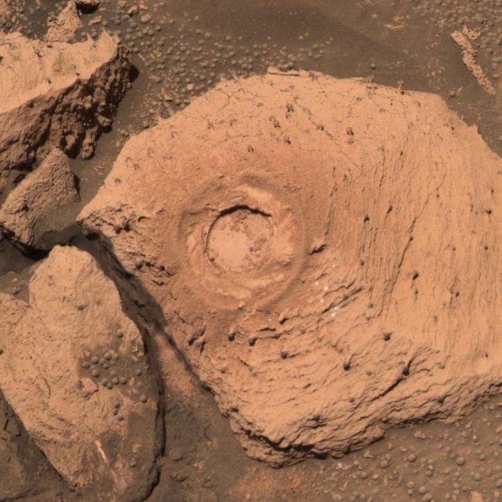 This image taken by NASA;s Mars Exploration Rover Opportunity shows the rock called 'Pilbara' located in the small crater dubbed 'Fram.' The rock appears to be dotted with the same 'blueberries,' or spherules, found at 'Eagle Crater.'