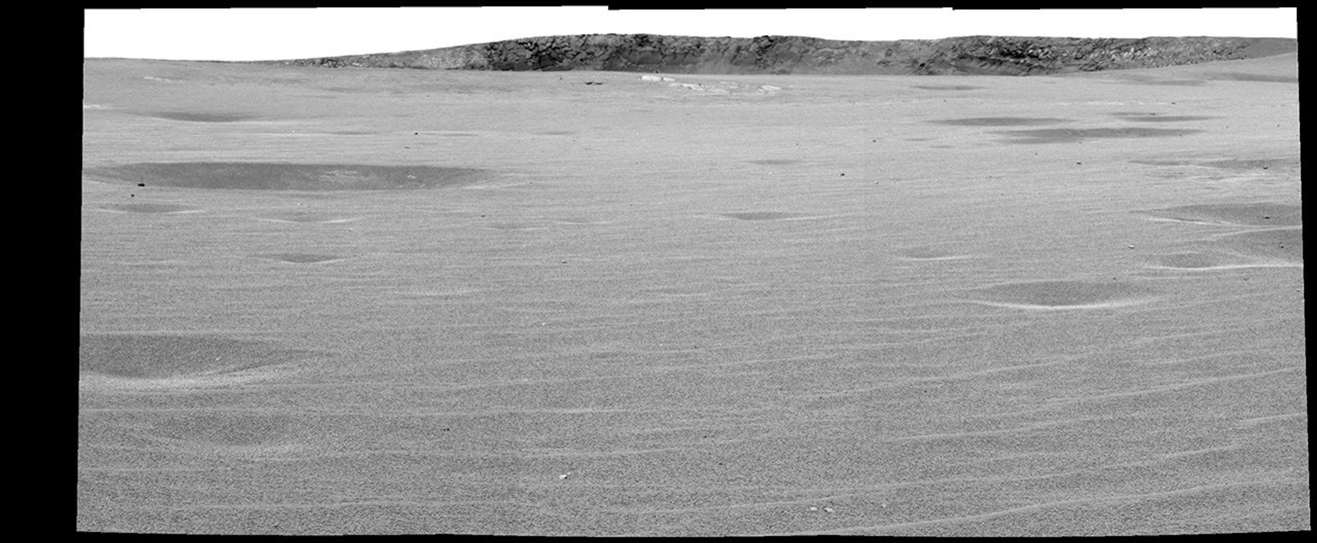 This image mosaic from NASA's Mars Exploration Rover Opportunity's panoramic camera was taken from a rover position of the rim of “Endurance Crater” on Mars. Familiar ripples and dimples, common are seen on the plains of Meridiani Planum.
