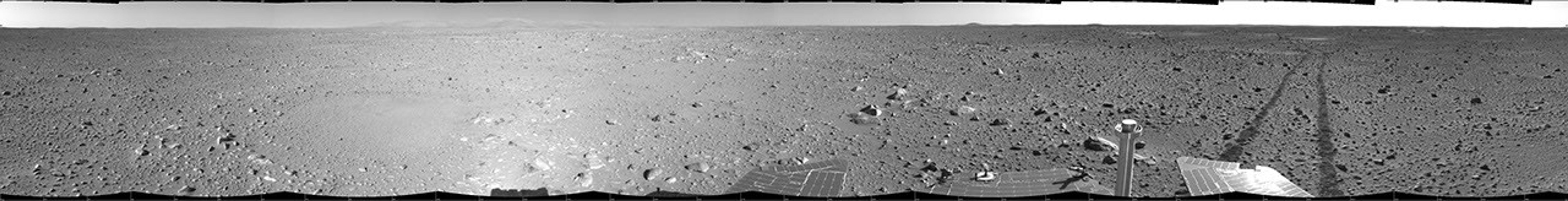This cylindrical-projection mosaic was created from images that NASA's Mars Exploration Rover Spirit acquired May 8, 2004.The rover was on its way to the 'Columbia Hills,' which can be seen on the horizon.