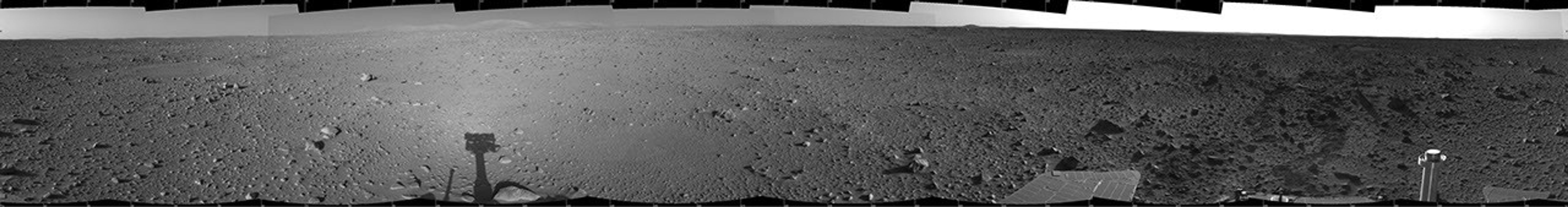 This cylindrical-projection mosaic was created from images that NASA's Mars Exploration Rover Spirit acquired May 8, 2004.The rover was on its way to the 'Columbia Hills,' which can be seen on the horizon.