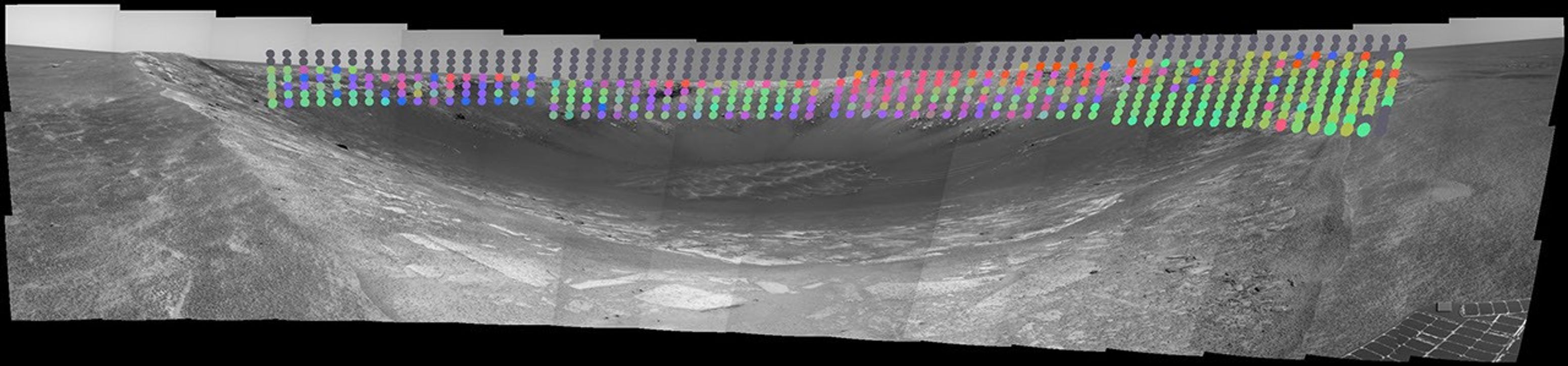 Surface composition in 'Endurance Crater' is mapped with color-coded interpretation of data from NASA's Mars Exploration Rover Opportunity. The information has been overlaid onto a view of a crater on Mars.