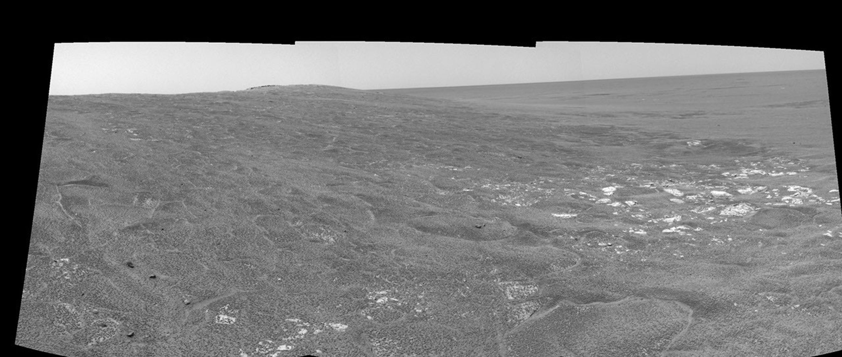 This image shows NASA's Mars Exploration Rover Opportunity sitting along the rim of 'Endurance Crater' in the Meridiani Planum region of Mars on May 15, 2004.