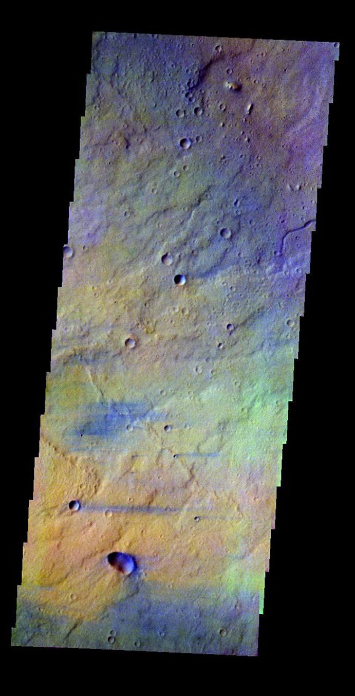 This false-color image released on May 18, 2004 from NASA's 2001 Mars Odyssey of Syrtis Major on Mars was acquired August 20, 2002, during northern spring.
