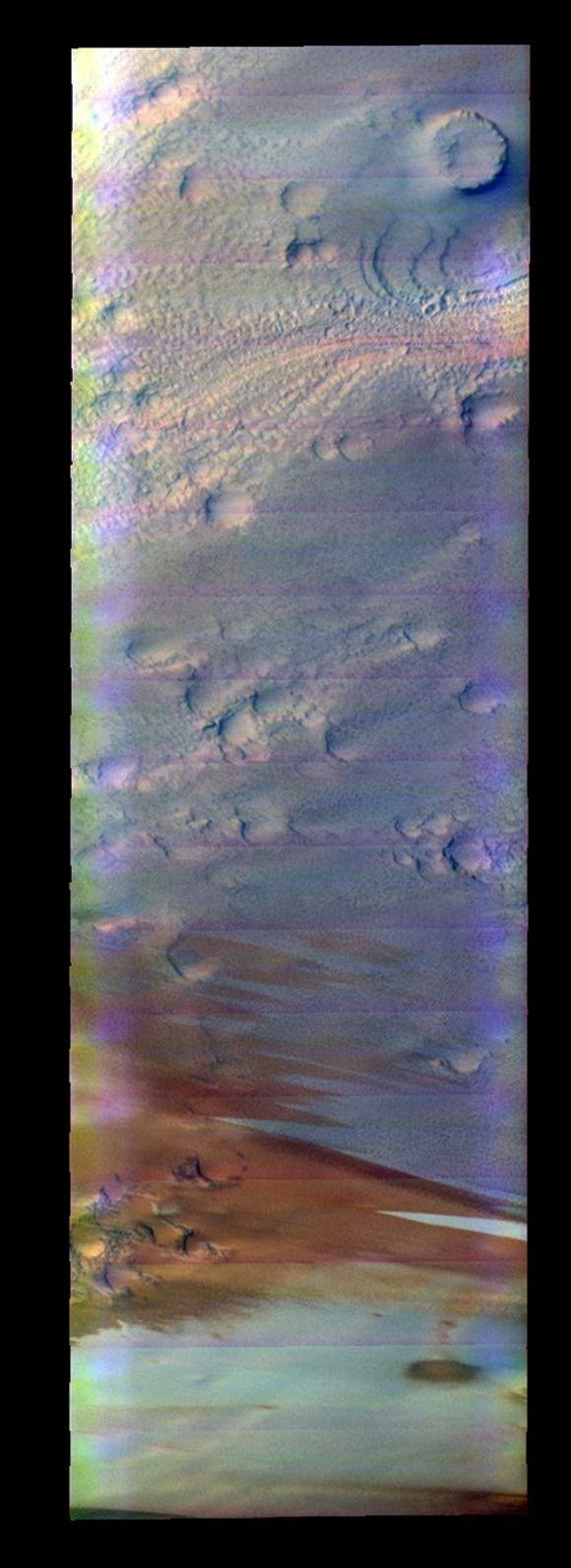This false-color image released on May 28, 2004 from NASA's 2001 Mars Odyssey was collected February 29, 2004 during the end of southern summer season in Mars' south polar region.
