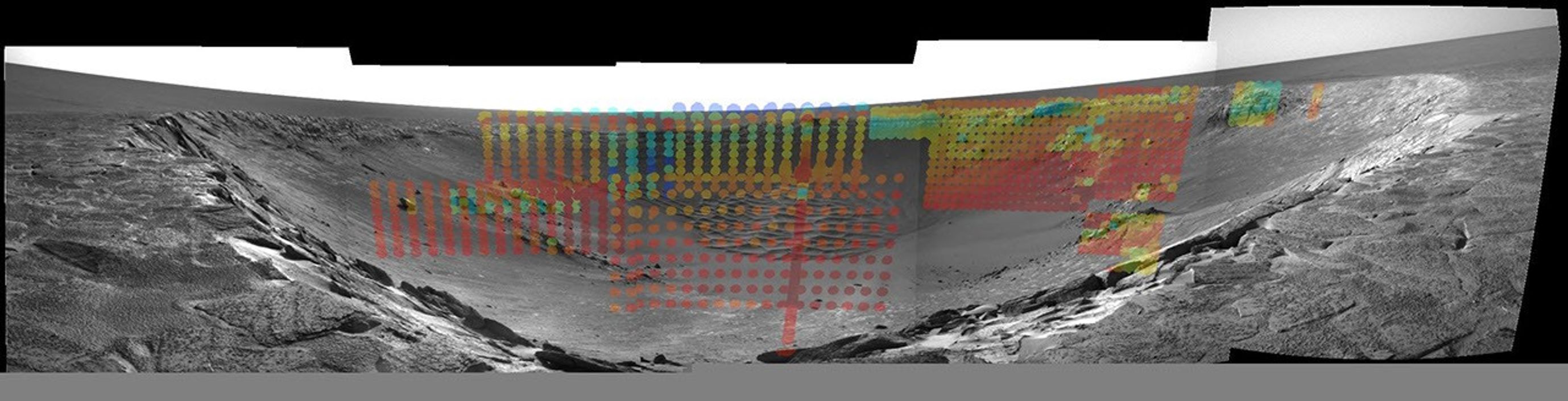 The colored dots in this image mosaic NASA's Mars Exploration Rover Opportunity denote thermal data in features that make up the impact crater known as 'Endurance' on Mars.