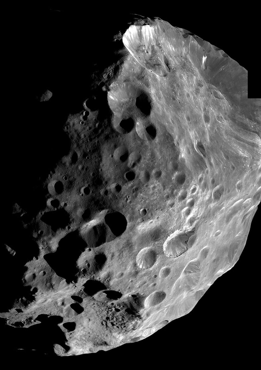 During its historic close encounter with Phoebe, NASA's Cassini spacecraft captured a series of high resolution images of the small moon, six of which have been put together to create this mosaic.