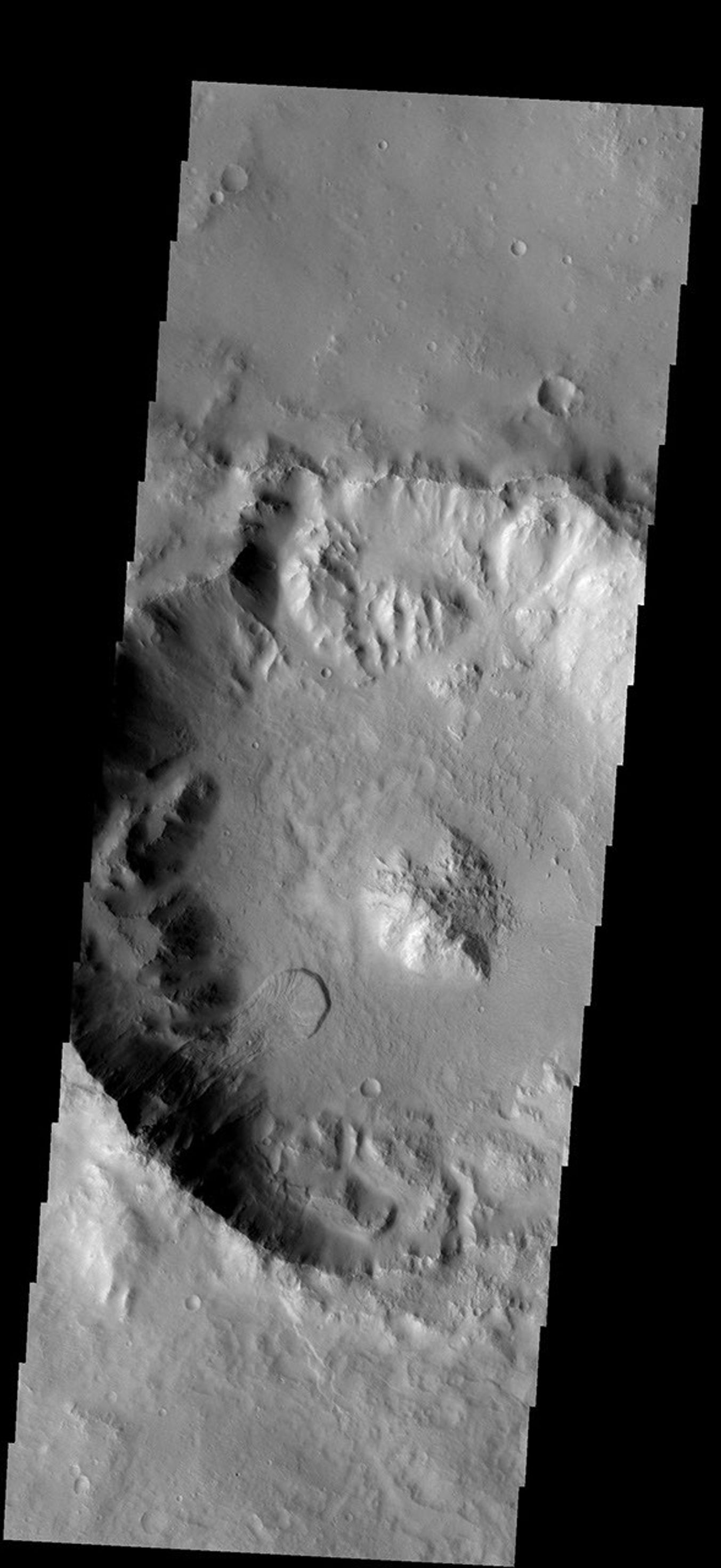 This landslide occurs in an unnamed crater on Mars southeast of Millochau Crater as seen by NASA's 2001 Mars Odyssey spacecraft.