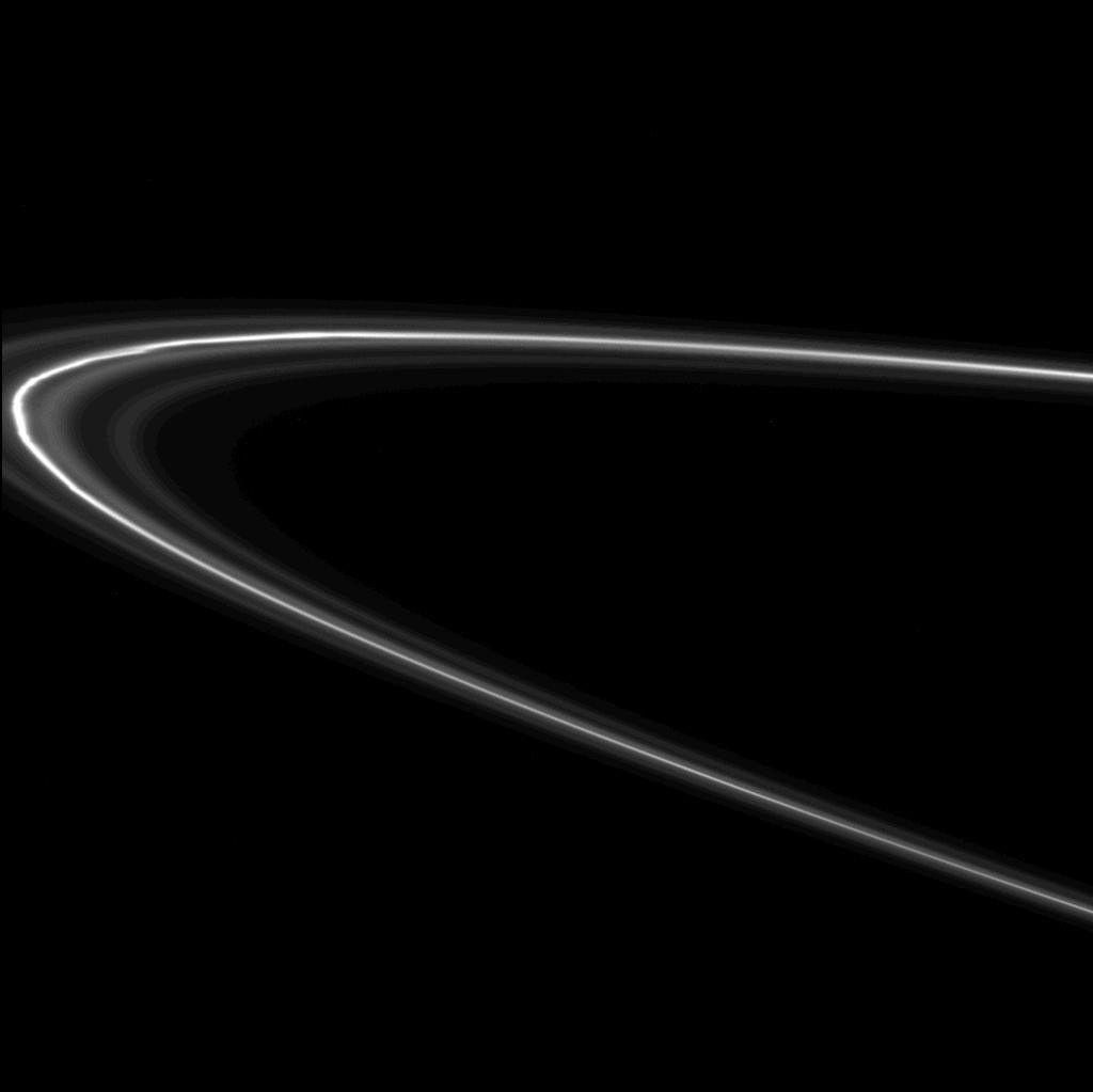 Zigzagging kinks and knots dance around Saturn in this frame from a movie of the F ring from NASA's Cassini spacecraft.