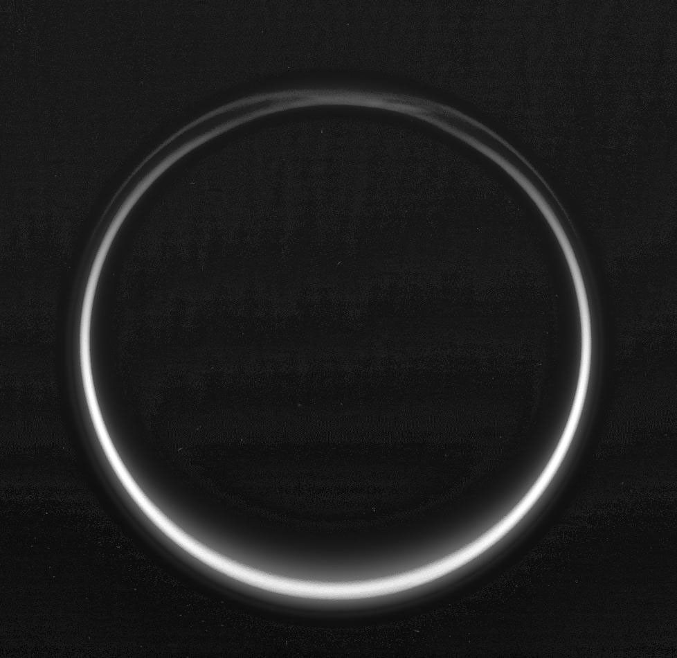 This image of Titan's night side was taken during NASA's Cassini spacecraft very close flyby of the smoggy moon on Feb. 15, 2005.