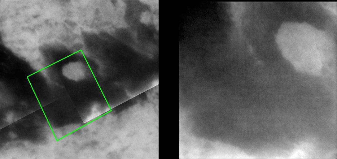 A new image of Titan taken by NASA's Cassini spacecraft provides a closer, clearer view of an interesting bright feature surrounded by darker material.