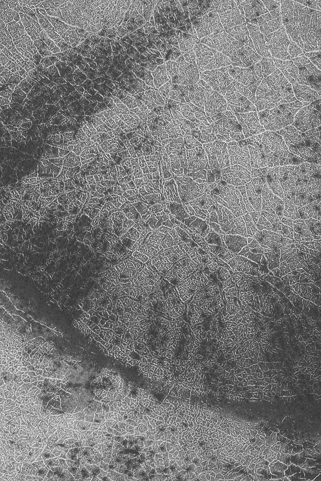 NASA's Mars Global Surveyor shows polar polygonal patterns on the surface of the south polar region on Mars.