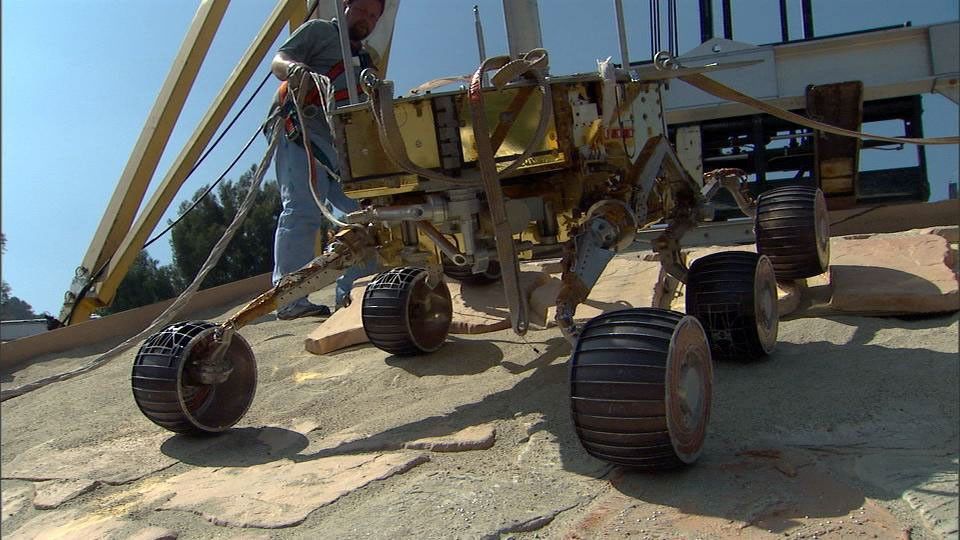 This image taken at NASA's Jet Propulsion Laboratory shows a rover test drive up a manmade slope.
